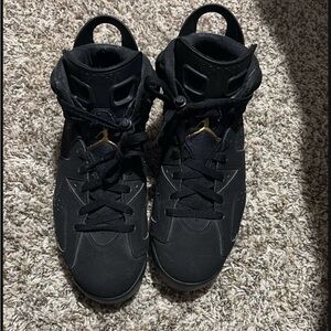 Jordan Black and Gold Sneakers